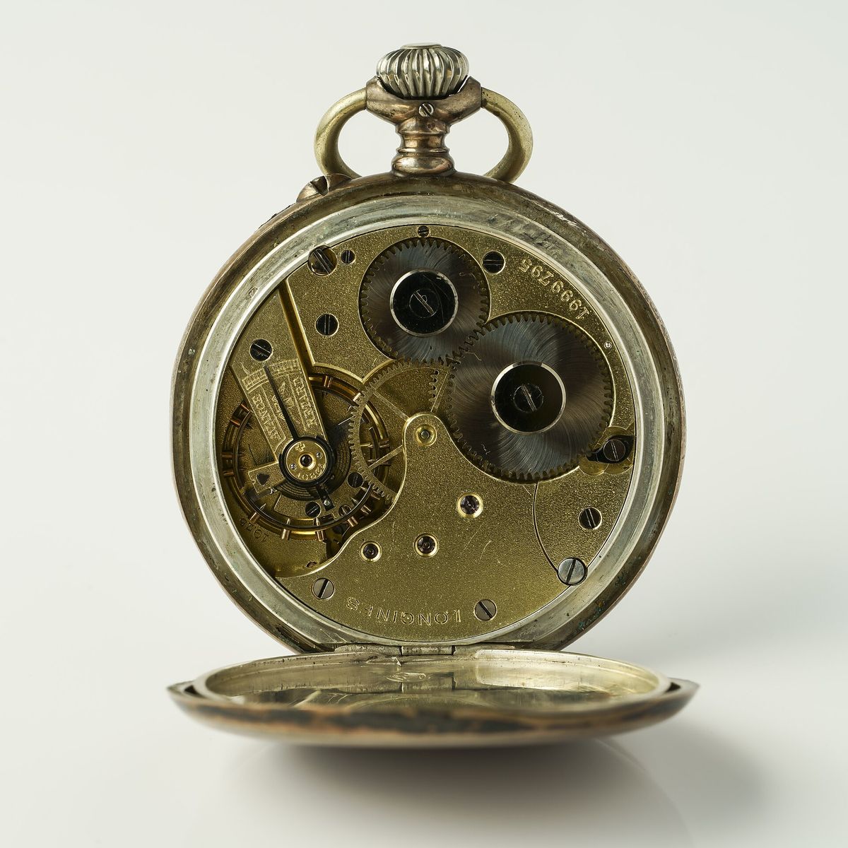 Montre de poche Longines en argent vers 1900, fond ouvert sur son mouvement signé