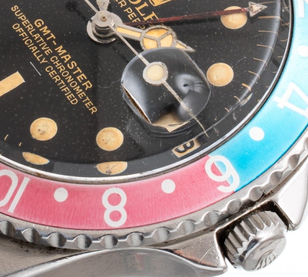 Rolex GMT-Master ref. 1675 des années 1960, lunette rouge et bleue délavée et protège-couronne pointus